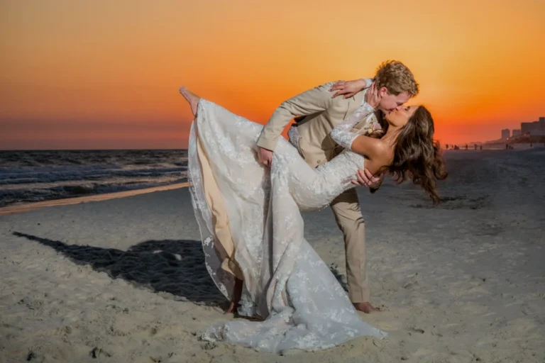 Golf Shores Wedding Photographer Bride and Groom Photo into the Sunset on the Beach