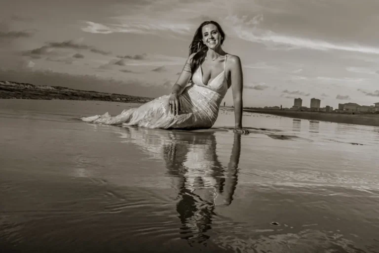 Golf Shores Wedding Photographer Photos of the bride and the reflection in the water on the beach I'm getting the water on the beach.