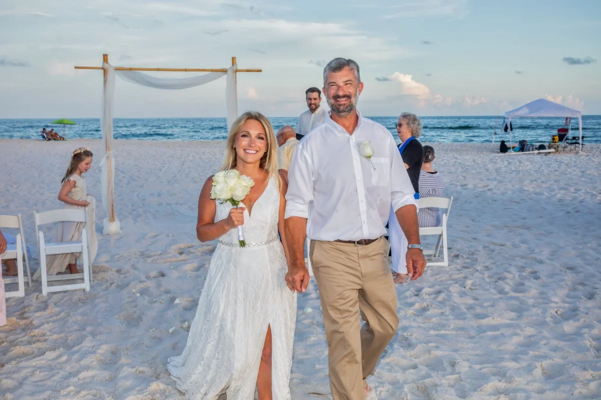 Bride and groom just married on the beach. Gulf shores photographer.