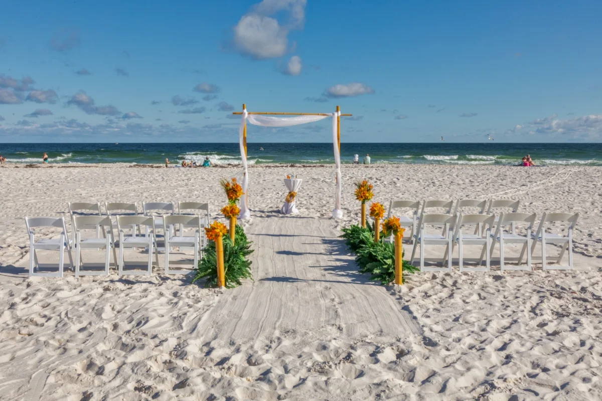 Orange Beach photographer shooting a beach wedding set up.