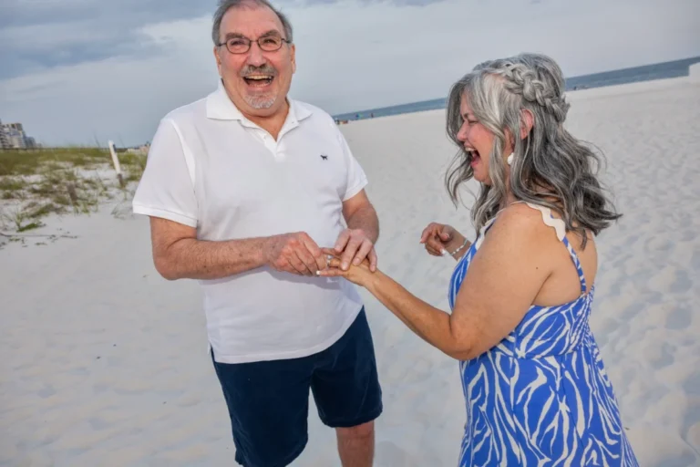 Bride and groom having fun during their wedding shot by gulf shores photographers.