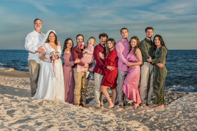 Large wedding group on the beach. Gulf Shores Wedding Photographer. Gulf Shores wedding photographer.